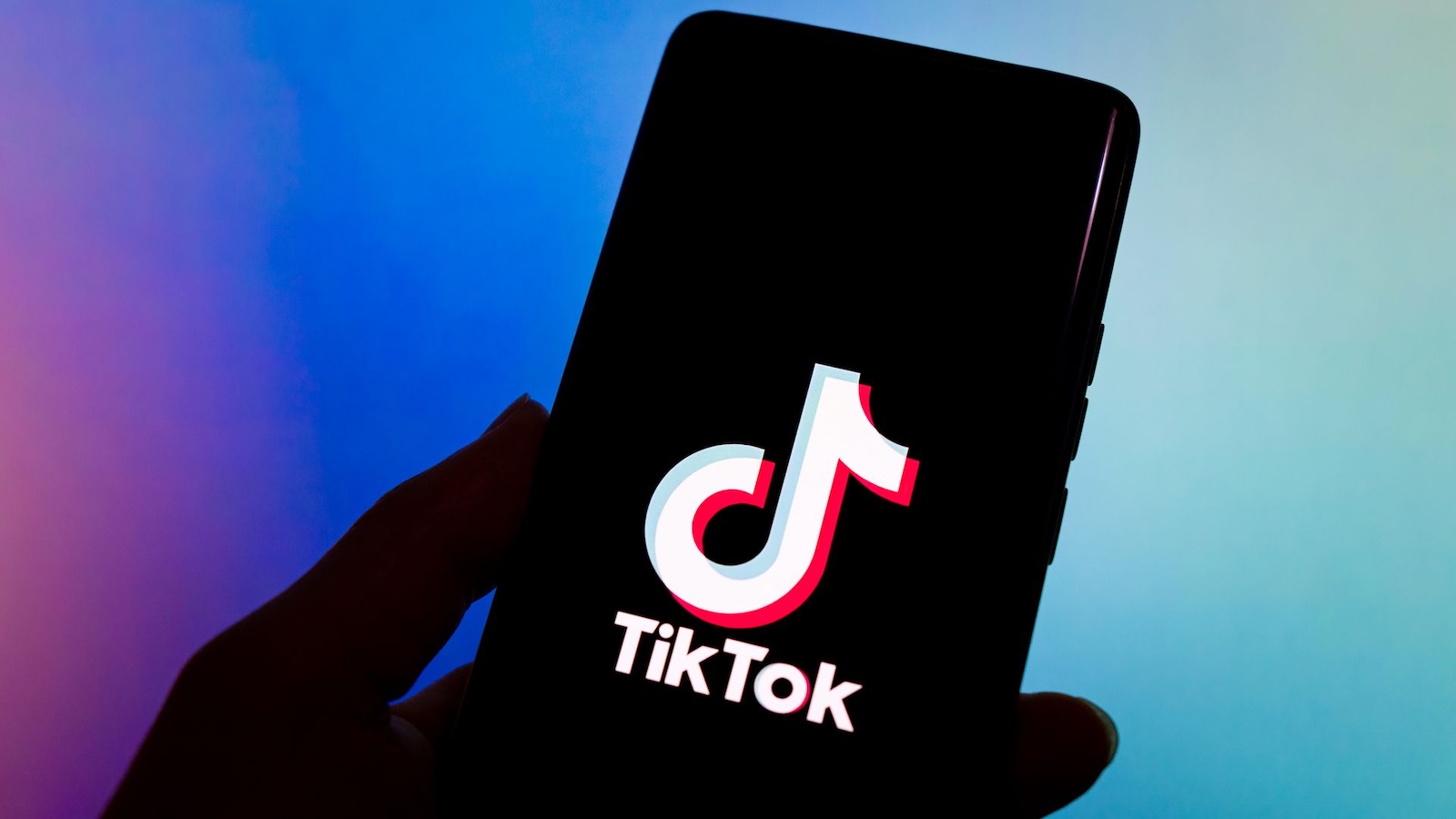 Un'immagine con il logo di TikTok