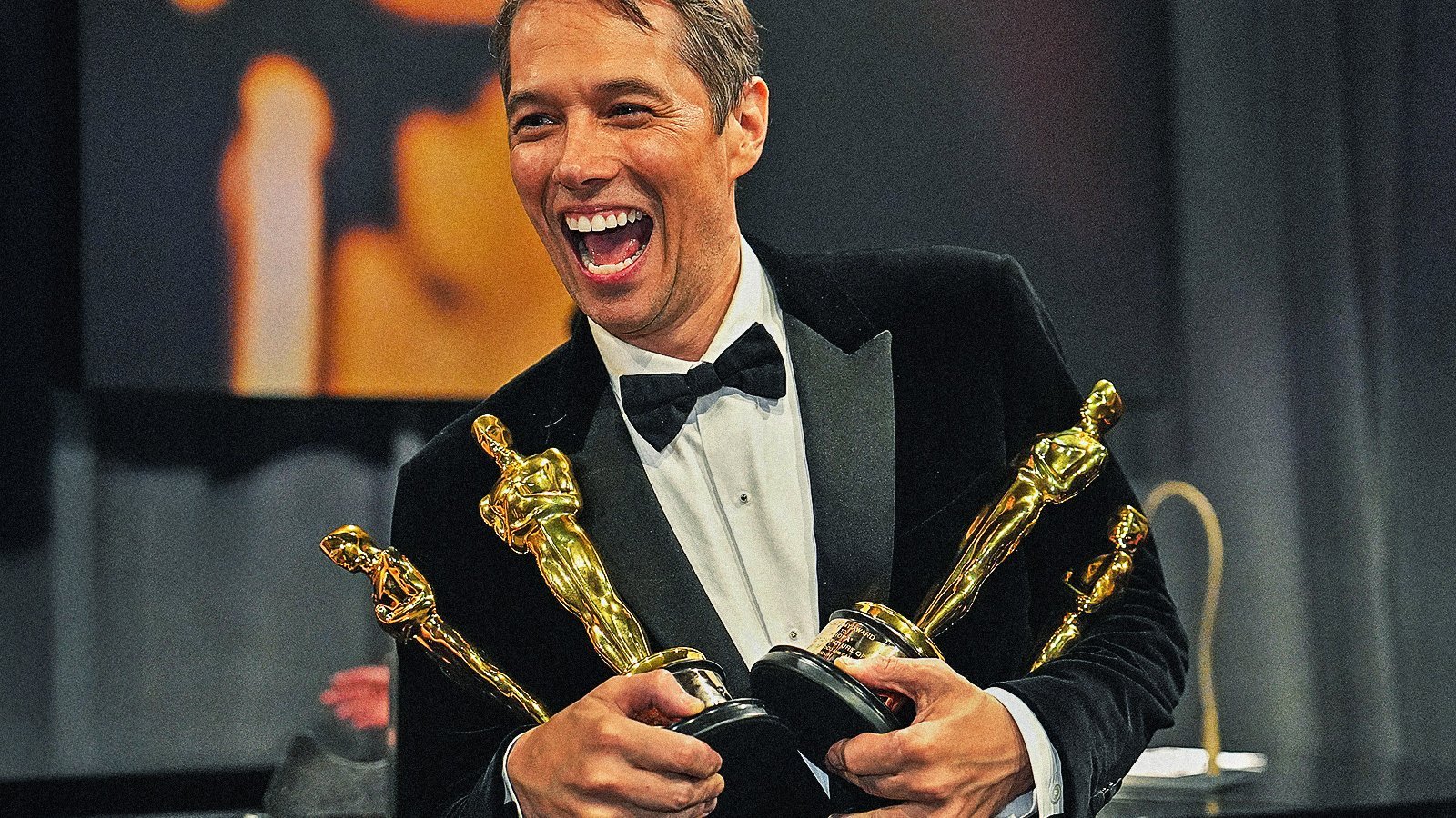 Sean Baker con i suoi quattro Oscar