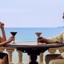 Reflection in a Dead Diamond: Fabio Testi e Maria De Medeiros in una scena