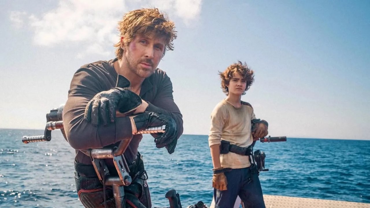 Star Wars: Starfighter, Ryan Gosling e il giovane protagonista del film in un'immagine