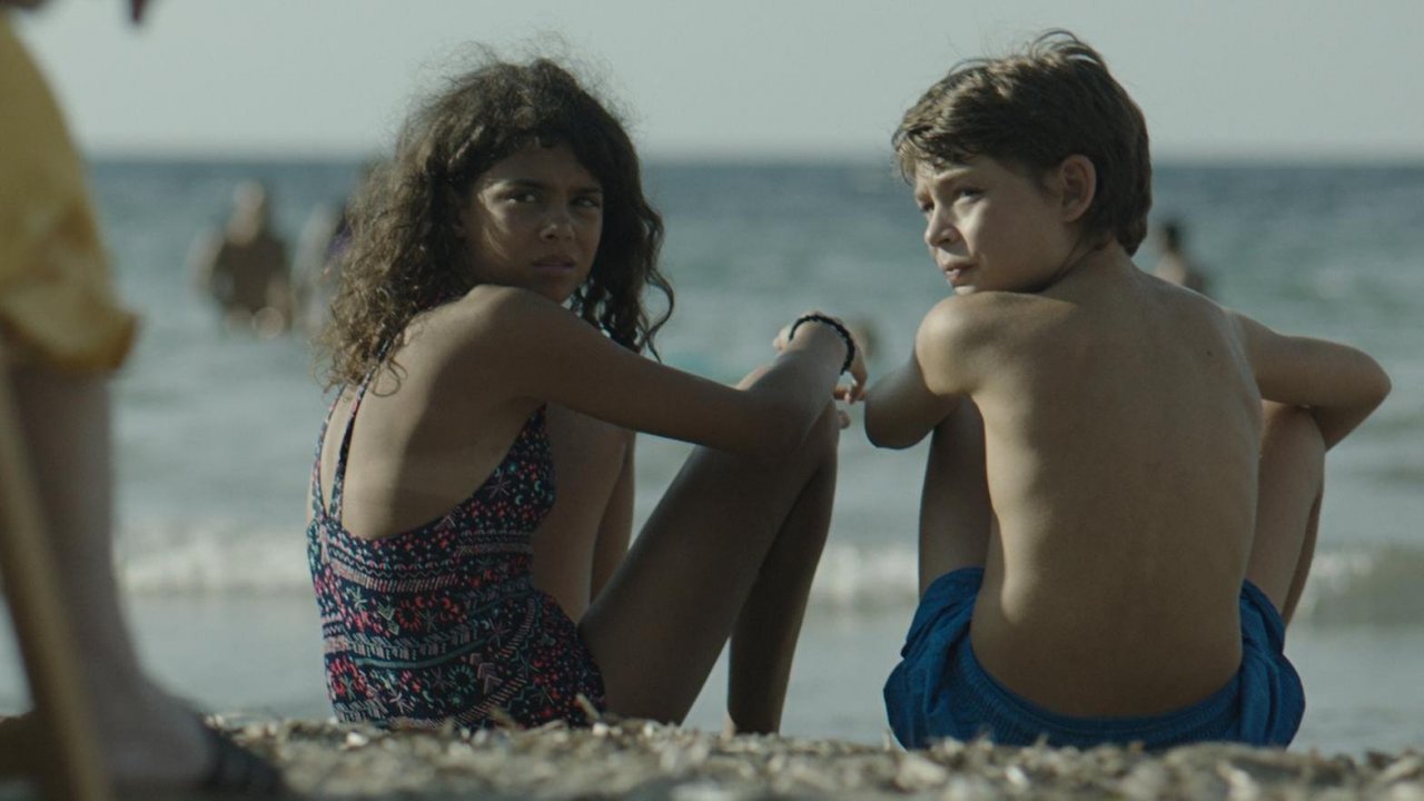 Marco Fiore in spiaggia insieme a Martina Ziami