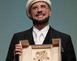 John Travolta premiato a sorpresa a Cannes 2026 con una Palma d'oro onoraria